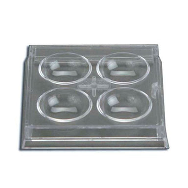 Clear plastic slide with four circular compartments on a white background
