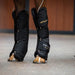 Equestrian leg guards with activomed branding on a horse's legs.