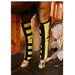 girl placing infrared heating pad horse's back legs