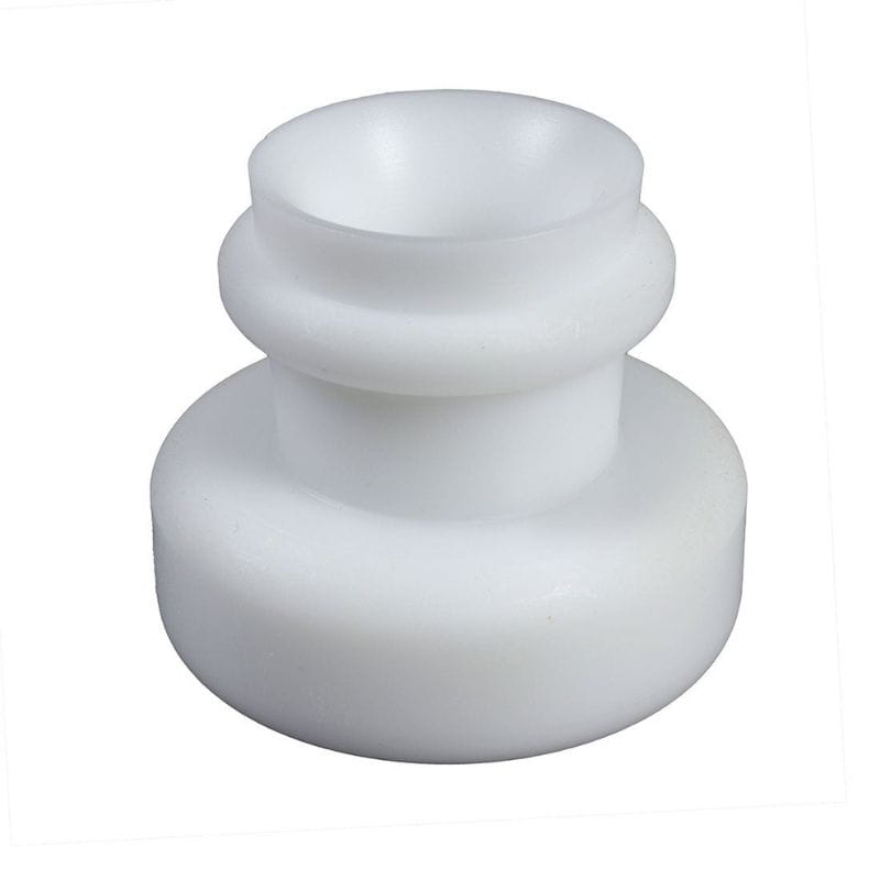 White plastic knob on a white background
