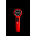 Red handheld device with digital display on a black background