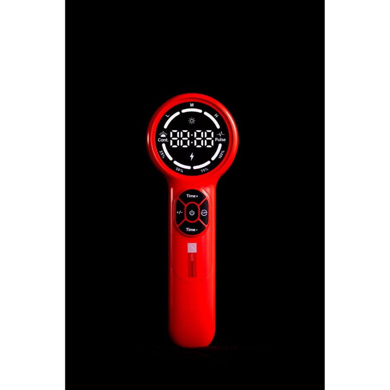 Red handheld device with digital display on a black background