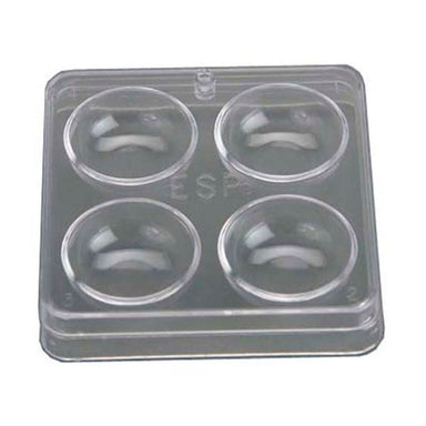 Clear plastic mold with four circular cavities on a white background