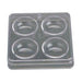 Clear plastic mold with four circular cavities on a white background