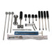 Collection of various tools including screwdrivers and a metal rod on a white background