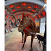 Brown Horse receiving solarium treatment at a stable