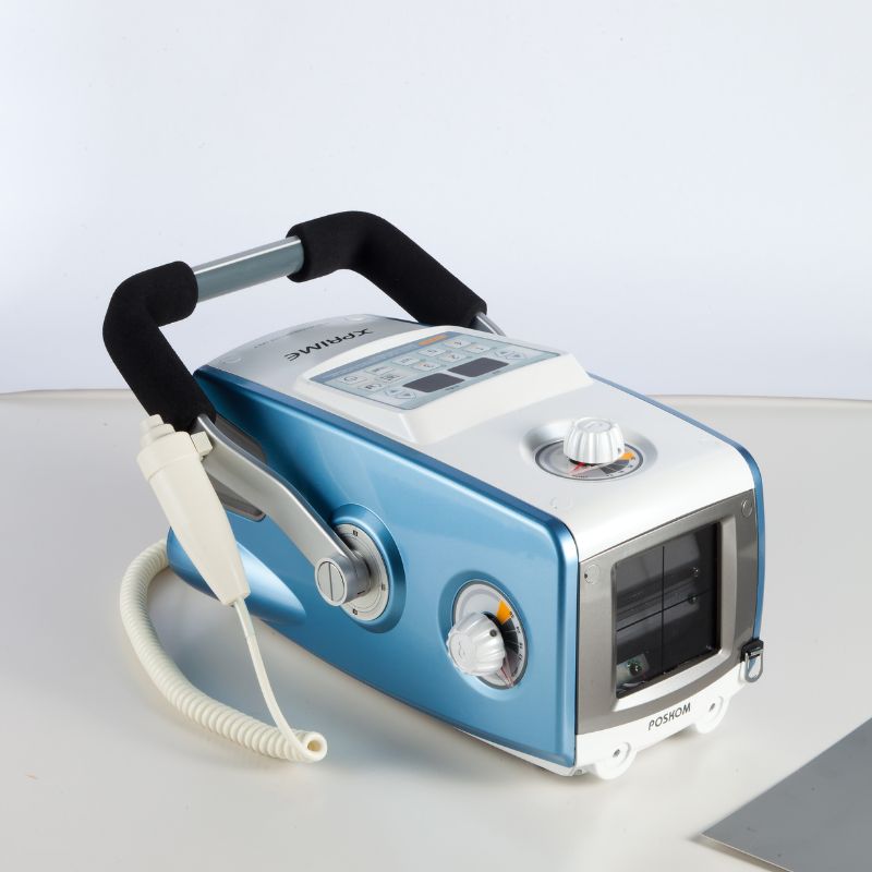 Blue and white medical device on a light gray background