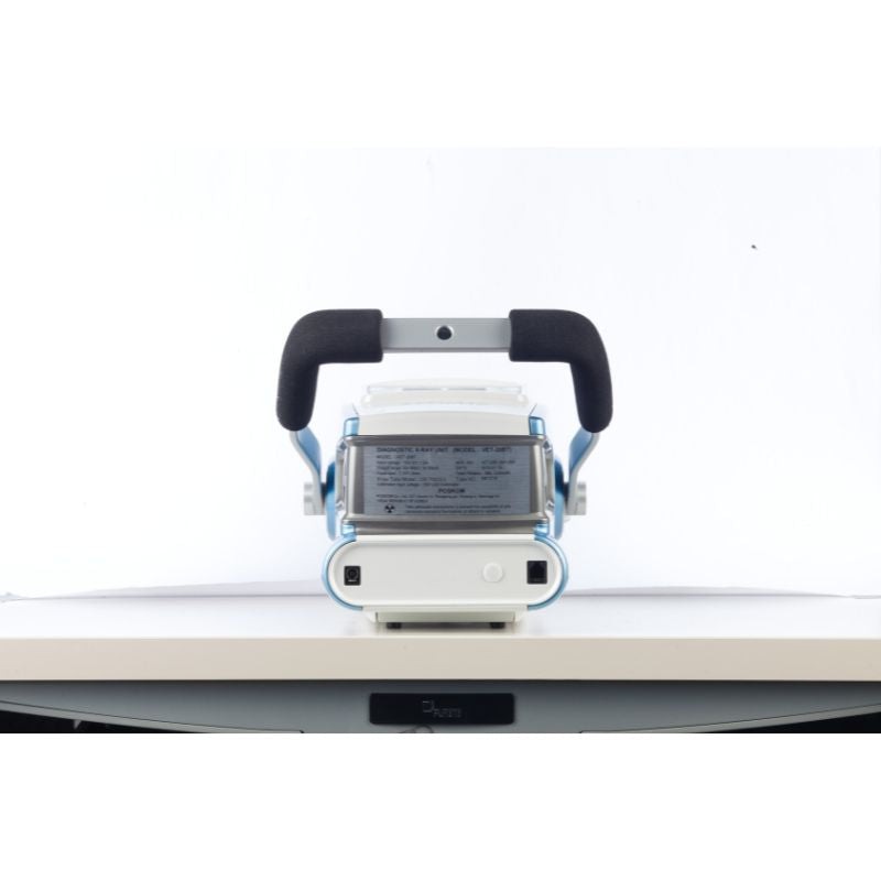 White electronic device with black handle on a white background