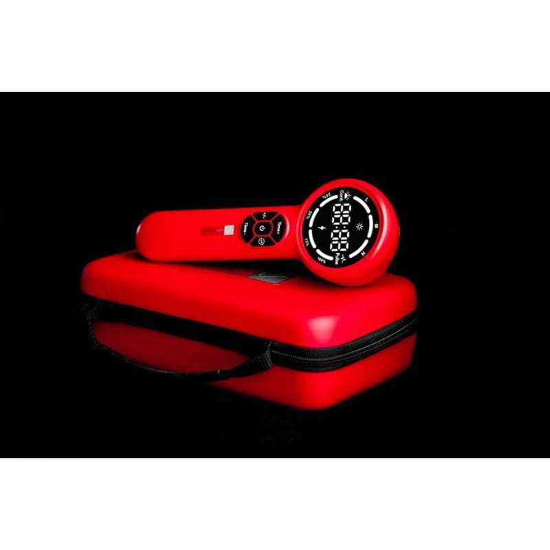 Red electronic device with digital display on a black background