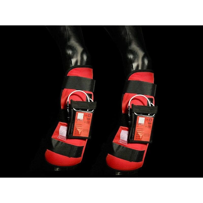 Red PEMF leg wraps for horses with black straps on a dark background