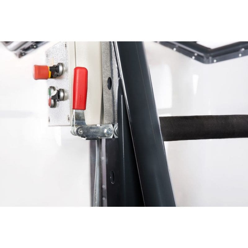Close-up of a mechanical component with red and black parts on a white background