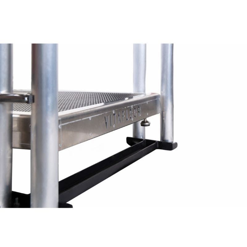 vitafloor vibration plate metal platform with cylindrical legs on a white background