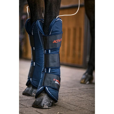 Navy protective leg wraps on a horse's legs with 'Activ' branding.