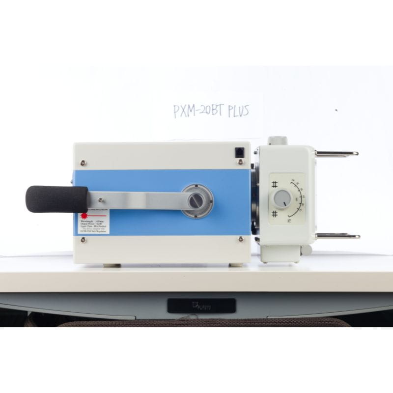 Sewing machine on a white background with 'PXM-20BT PLUS' text.
