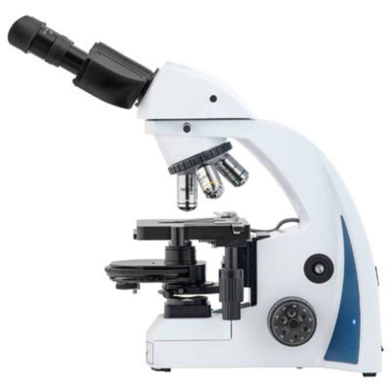 White and blue compound microscope on a white background