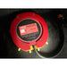 Red Pro Focus disc golf target on a black background
